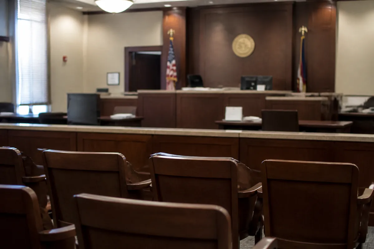Illustration of an immigration judge closing an asylum case based on the file alone, without a hearing for the applicant